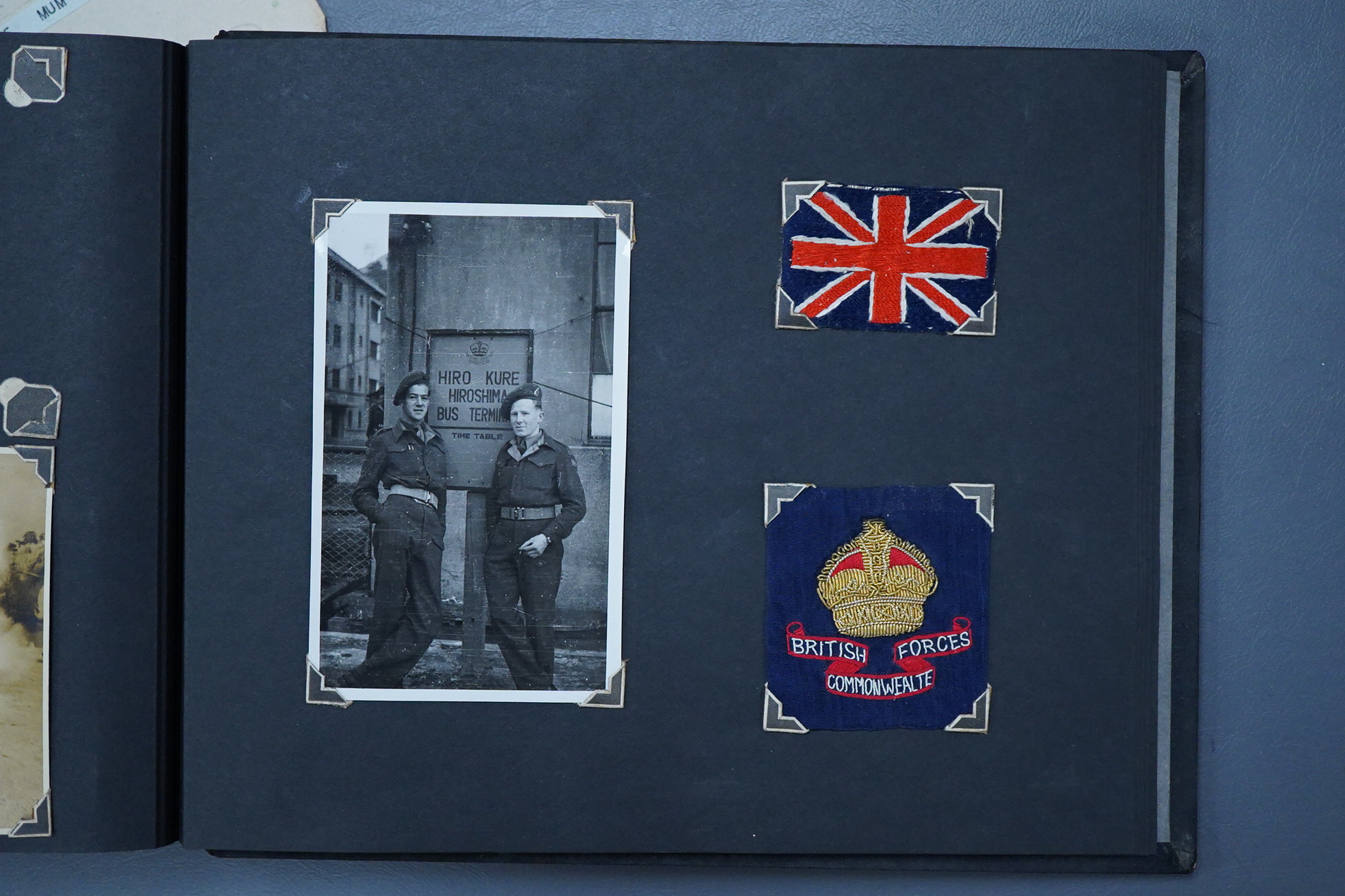 A Japanese photograph album, late 1940's to include banknotes and a telegram, together with a cigarette case